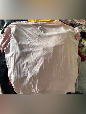 Women’s pink lululemon tee size 10